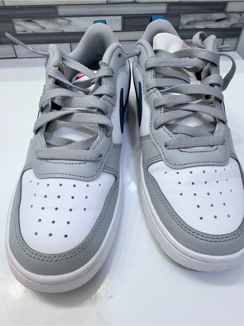 Nike Low-Top Sneakers in White, Gray, and Navy